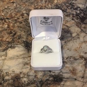 Opal and diamond ring